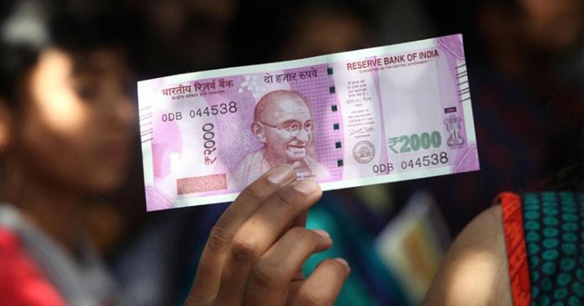 Rupee continues slide to hit record low; Sensex falls 509 pts